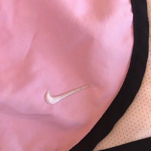 Light pink Nike running shorts